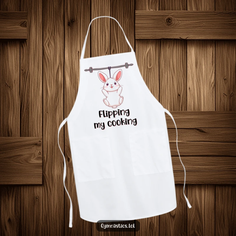 Funny rabbit apron showing a curious rabbit humorously hanging upside down from uneven bars, for a fun kitchen experience.
