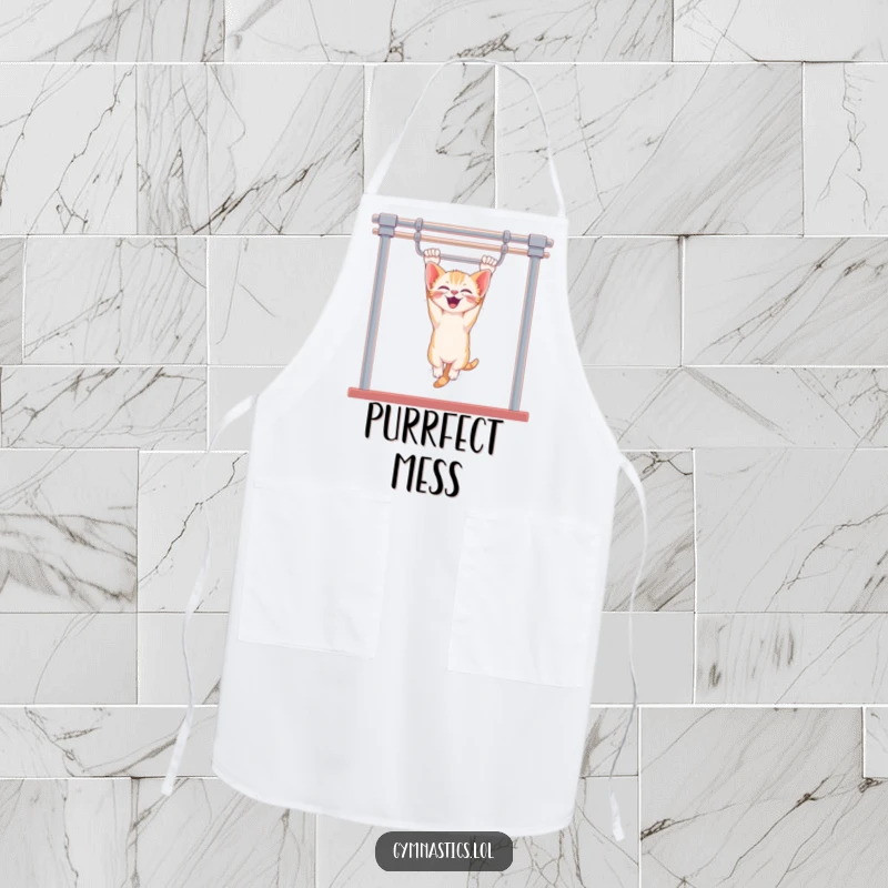Funny kitten apron featuring a giggling kitten hanging upside down from uneven bars, ideal for adding humor and a touch of playful fun to cooking.