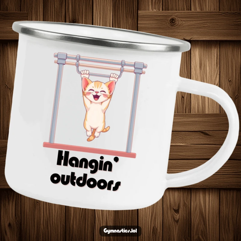 Funny kitten uneven bars camping mug showing a giggling kitten hanging upside down, perfect for outdoor adventures with a touch of playful humor.