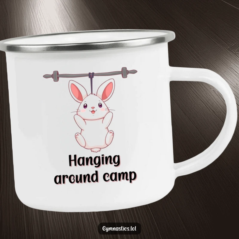 Funny rabbit camping mug showing a curious rabbit humorously hanging upside down from uneven bars, for quirky outdoor enjoyment.