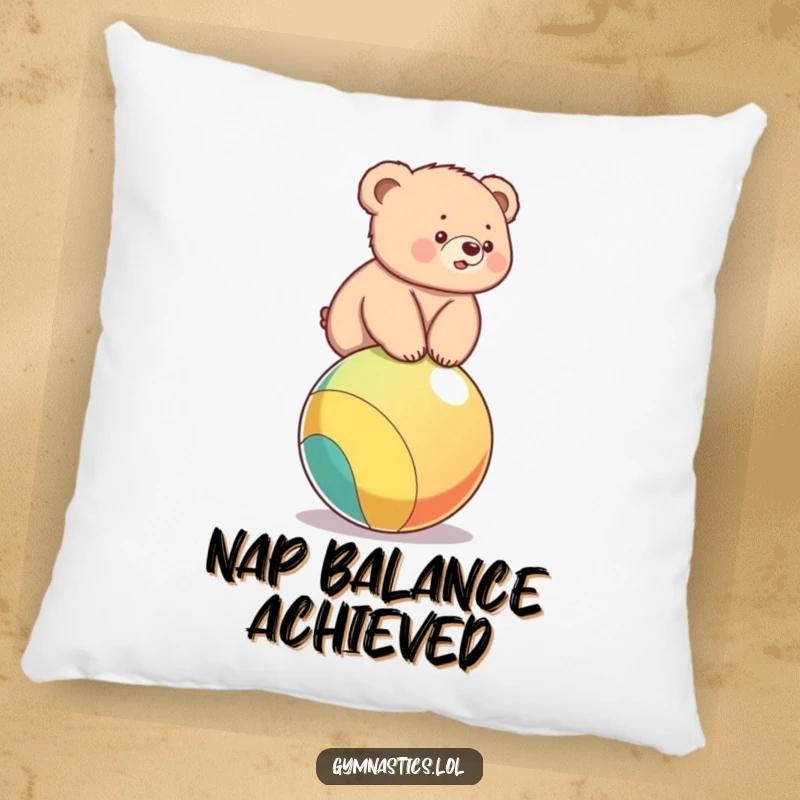 Funny pillow featuring a cute bear cub wobbling on a colorful ball, offering comfort and a humorous visual.