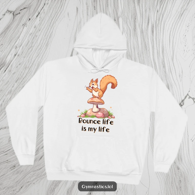 Funny hoodie graphic of a squirrel performing a dynamic somersault on a bouncy mushroom, capturing a moment of extreme fun.