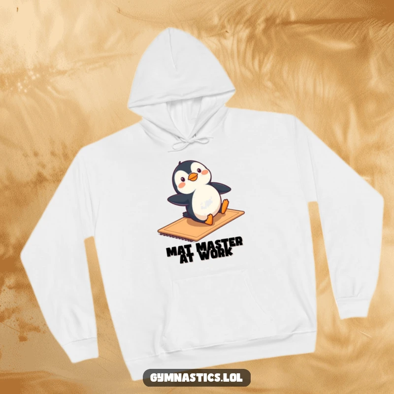 Funny hoodie featuring a happy penguin sliding with flair on a mat, embodying playful gymnastic energy.