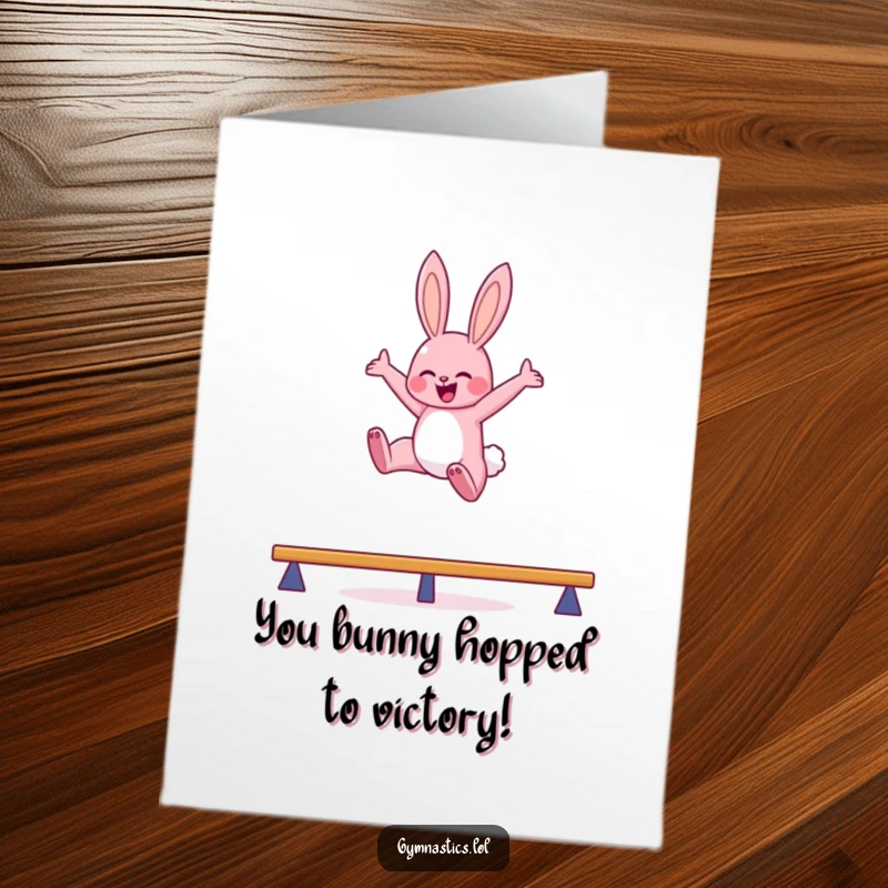 Funny Free Printable congratulations card: a pink bunny leaping dynamically in the air with arms outstretched on a balance beam.