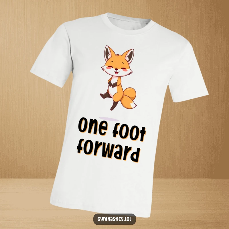 Funny T-shirt with a smiling fox performing an impressive balancing act on one dainty foot, radiating pure joy and silliness.