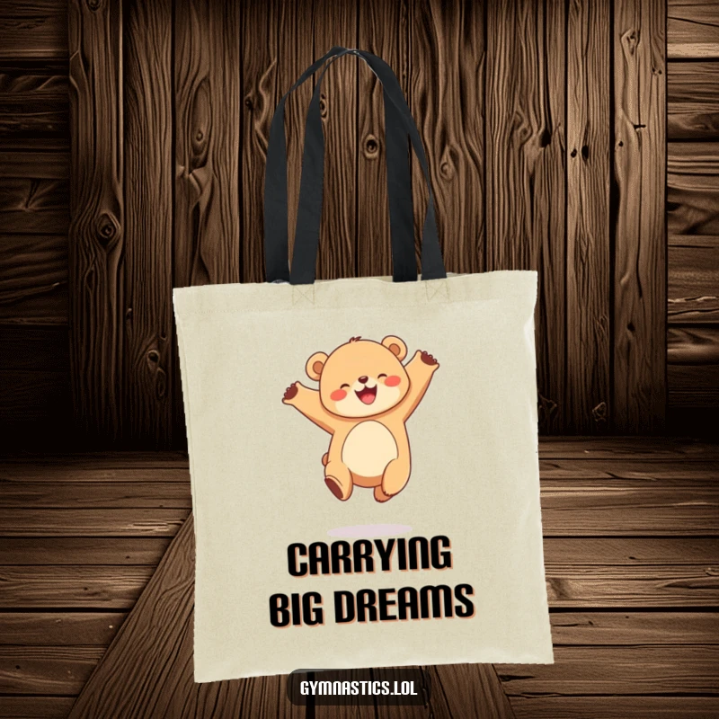 Funny tote bag with a joyful, round bear cub performing a graceful leap in the air, a charming and practical accessory.